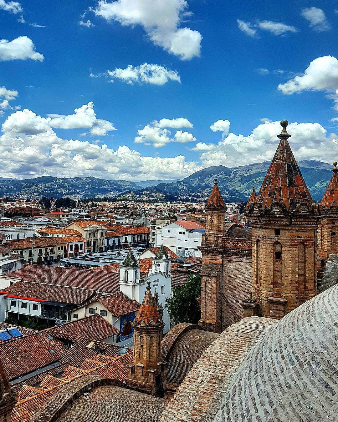 Skyline of churches and homes in Cuenca, Ecuador. Photo by Instagram user @pedroflores2286