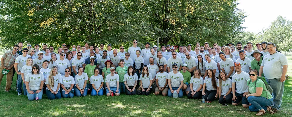 Extra Space Storage employees at Constitution Park in Salt Lake City, UT after planting trees