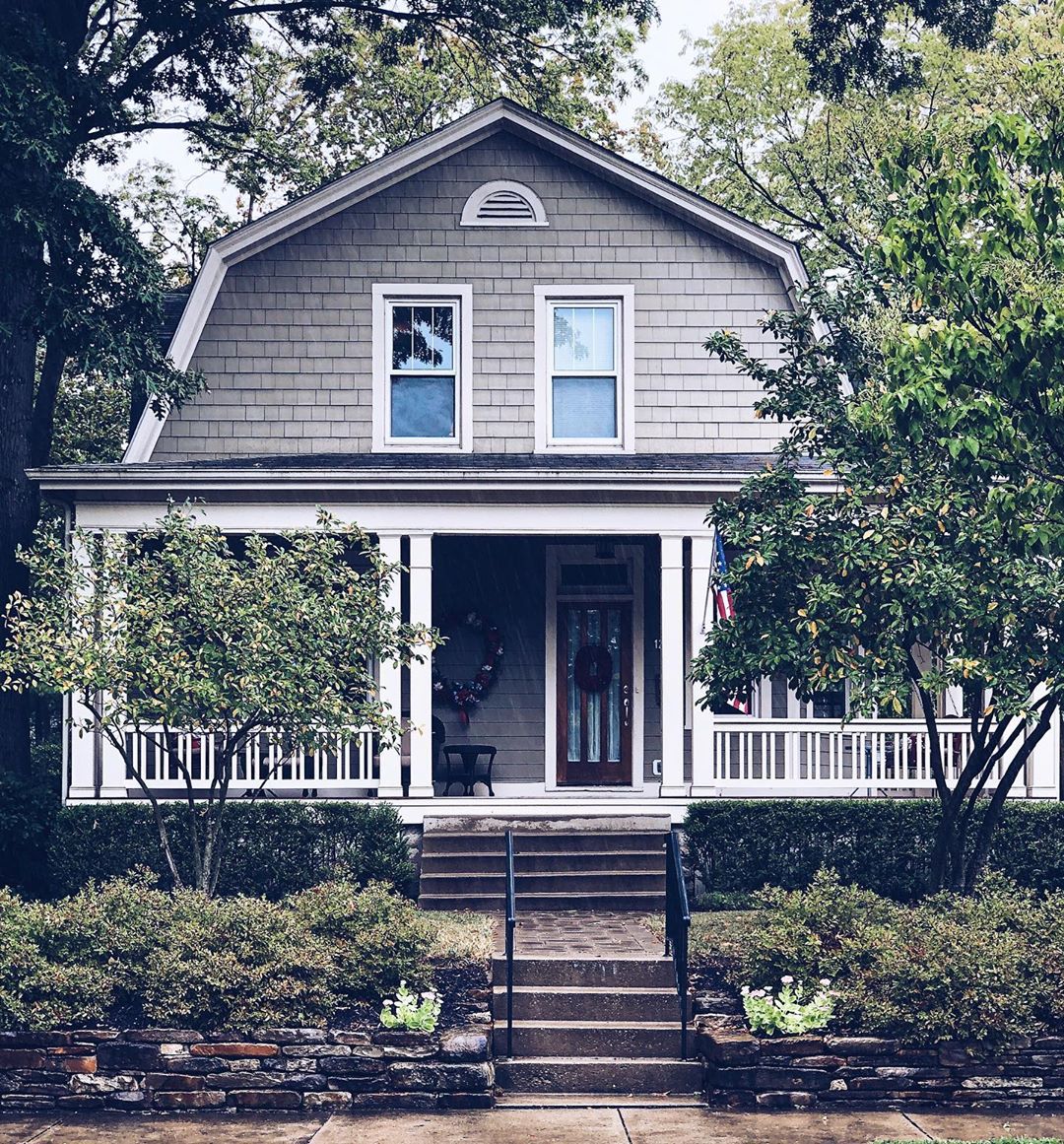 Two-story gray house with white pillars. Photo by Instagram user @occasionally.in.ohio