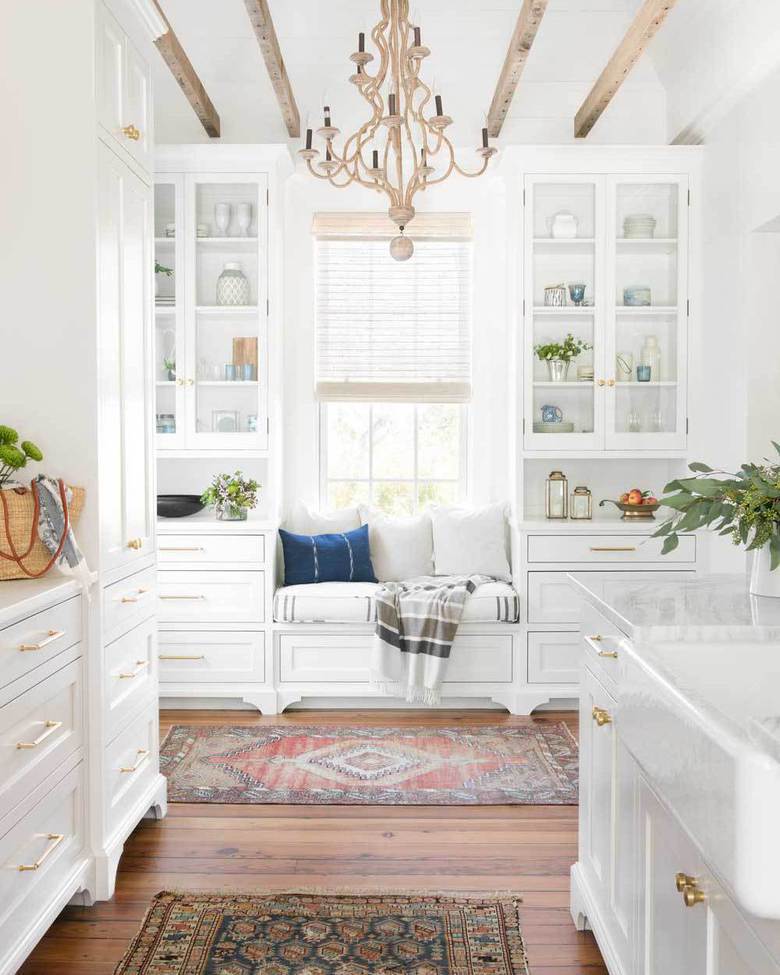 White kitchen with natural light. Photo by Instagram user @interiorsbyherlong