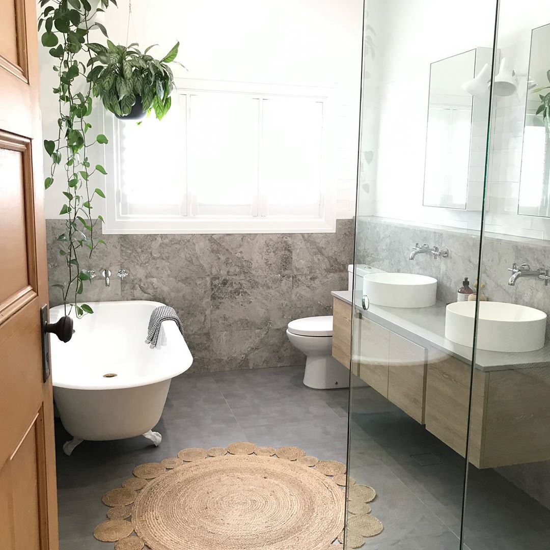 Modern bathroom with vintage rug. Photo by Instagram user @inside_78