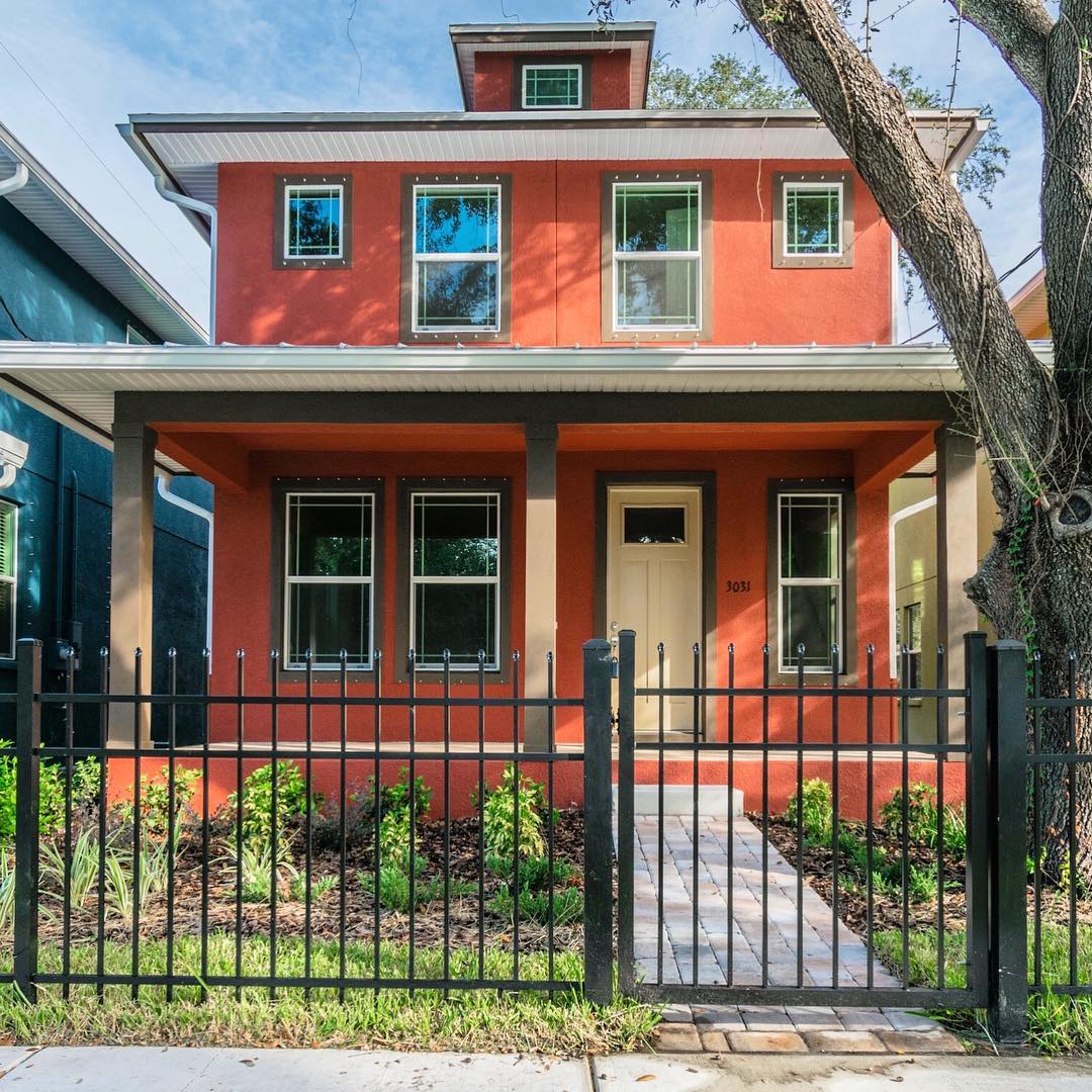 Two-story urban shotgun-style house in North Hyde Park/West Tampa, FL. Photo by Instagram user @domainhomesinc