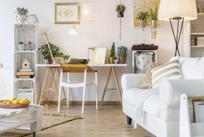 Living room with light colored walls and white couch