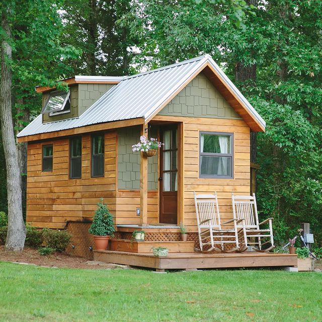 Exterior of a tiny house with a modern rustic design. Photo by Instagram user @windrivertinyhomes
