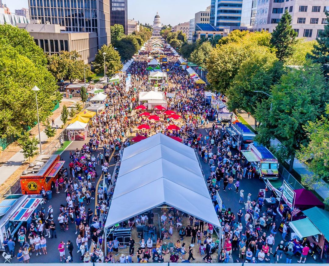 Aerial view of people at festival. Photo by Instagram user @aerialsacramento