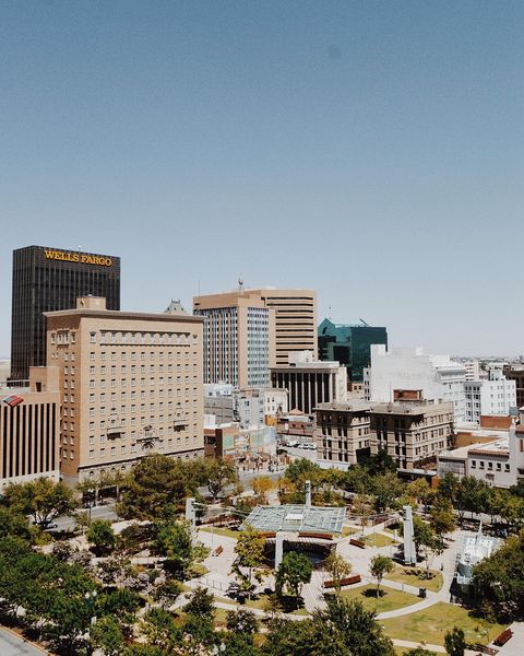 A view of downtown El paso, Texas, featuring skyscrapers and a central green space. @vftlphotos