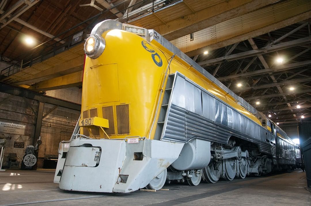 Giant yellow train in museum. Photo by Instagram user @borailroad