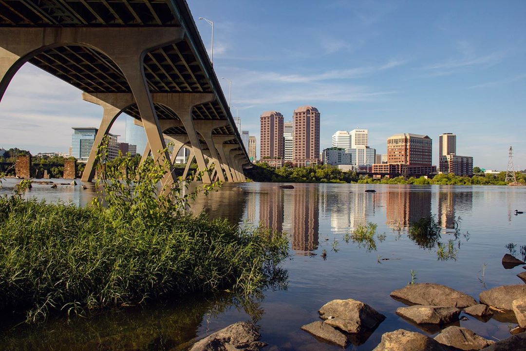 Richmond, VA skyline from the James River. Photo by Instagram user @harrisonkmirephoto