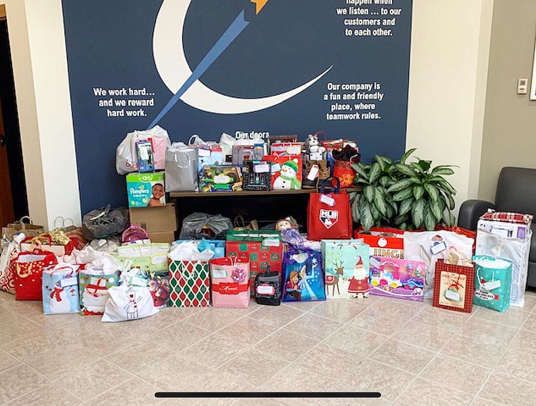 Presents clustered on ground. Photo by Instagram user @enterprise_boston