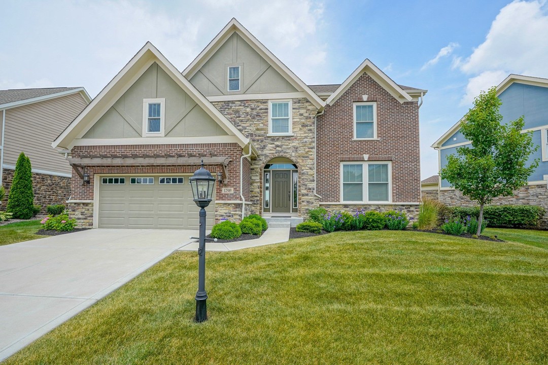 A brick home in Fishers. Photo by @erinmhundley