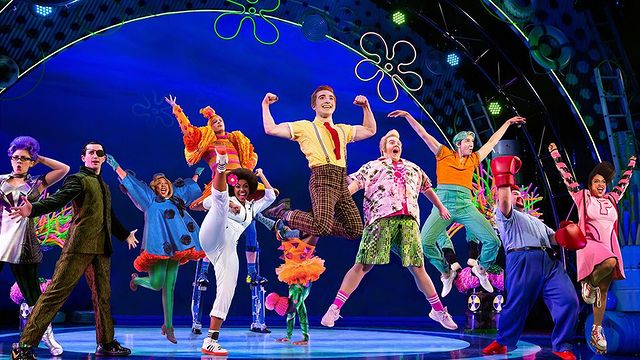 The cast of The Spongebob Musical jumping on stage at the Pantages Theater. Photo by Instagram user @dennis_did_that_play.