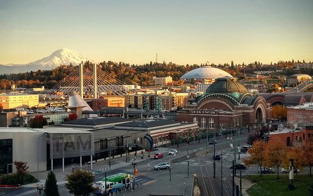 Sunset view of Tacoma showing Mt. Rainier, Tacoma Art Museum, and Union Station. Photo by Instagram user @outer_rim_art.