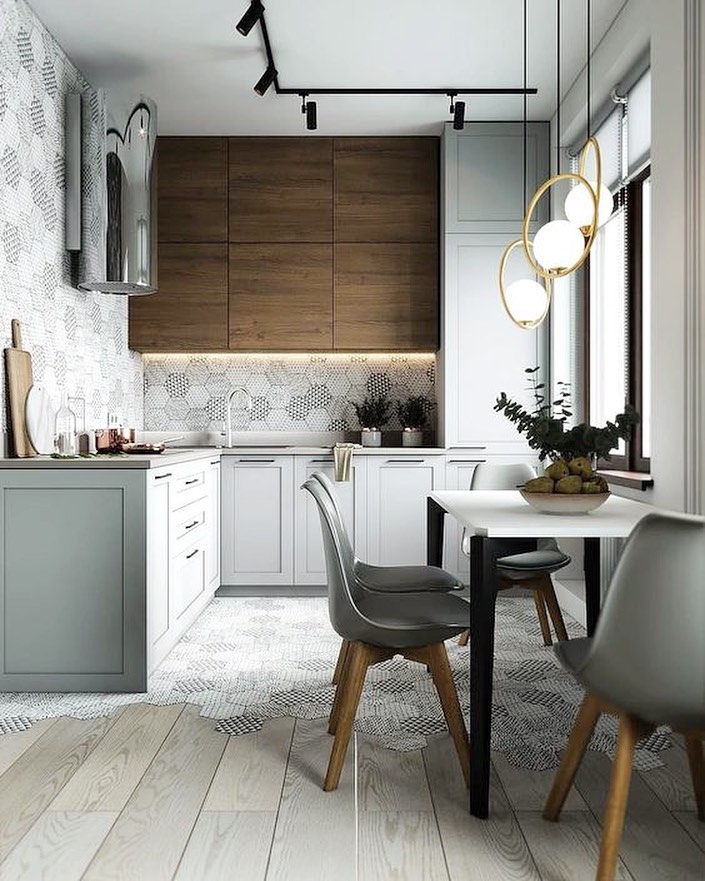 Gray minimalist kitchen with wood cabinets and geometric floors. Photo by Instagram user @luminlamphouse