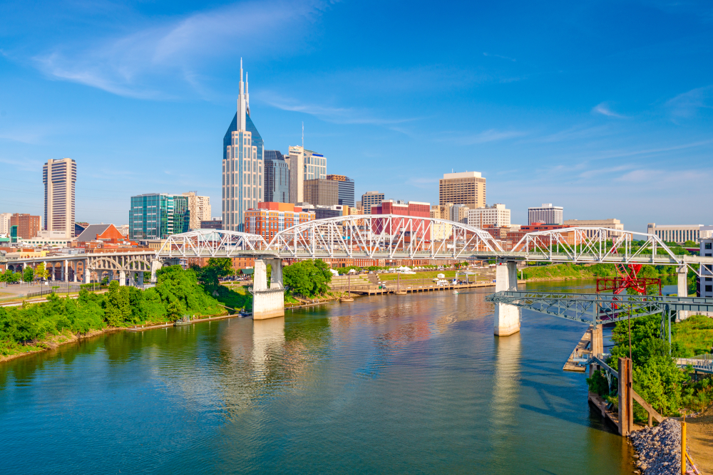 Skyline of tall buildings on sunny day in Downtown Nashville.