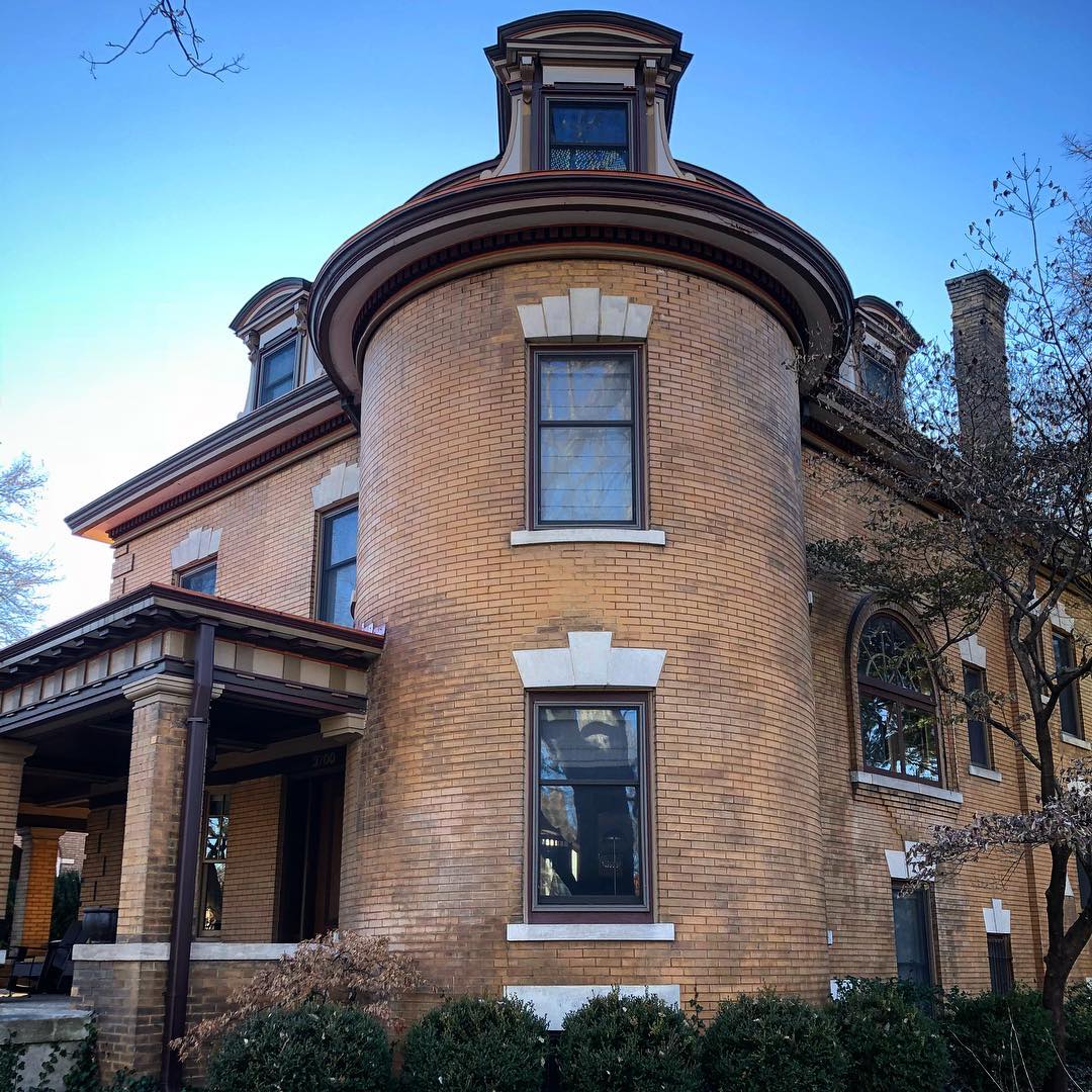 Historic brown brick home with brown trim. Photo by Instagram user @steel_dust