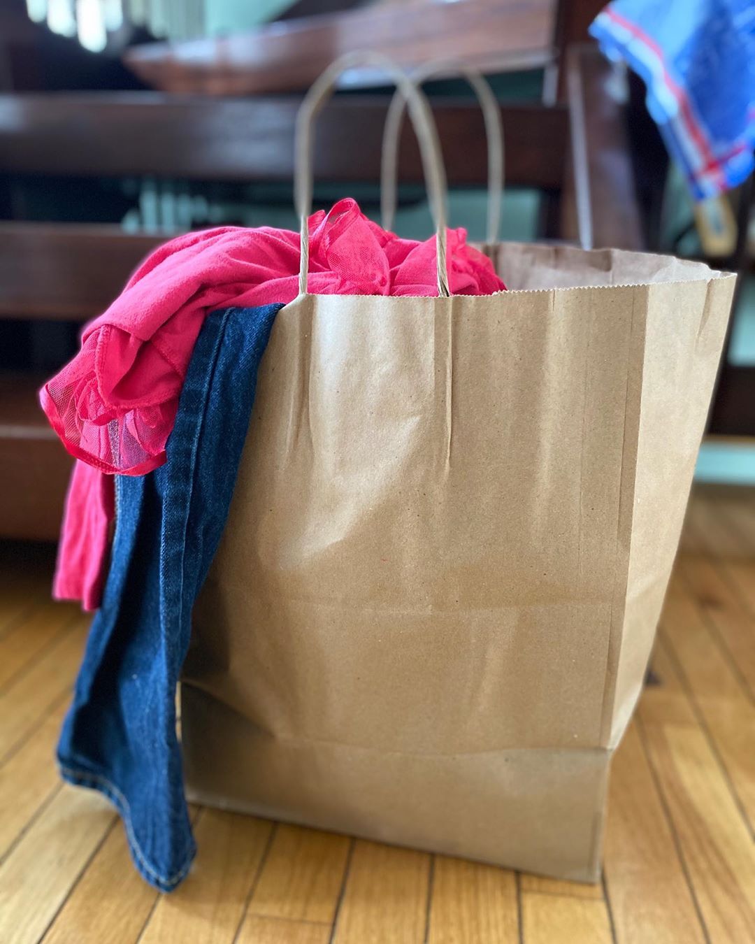 Brown bag of clothes. Photo by Instagram user @cahoots_company