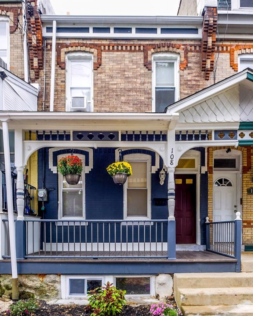 Navy and white house in Manayunk, Philadelphia. Photo by Instagram user @keepitrealestatephilly