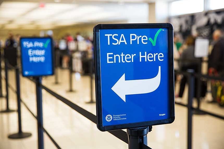 Blue TSA sign at the airport. Photo by Instagram user @flylansing