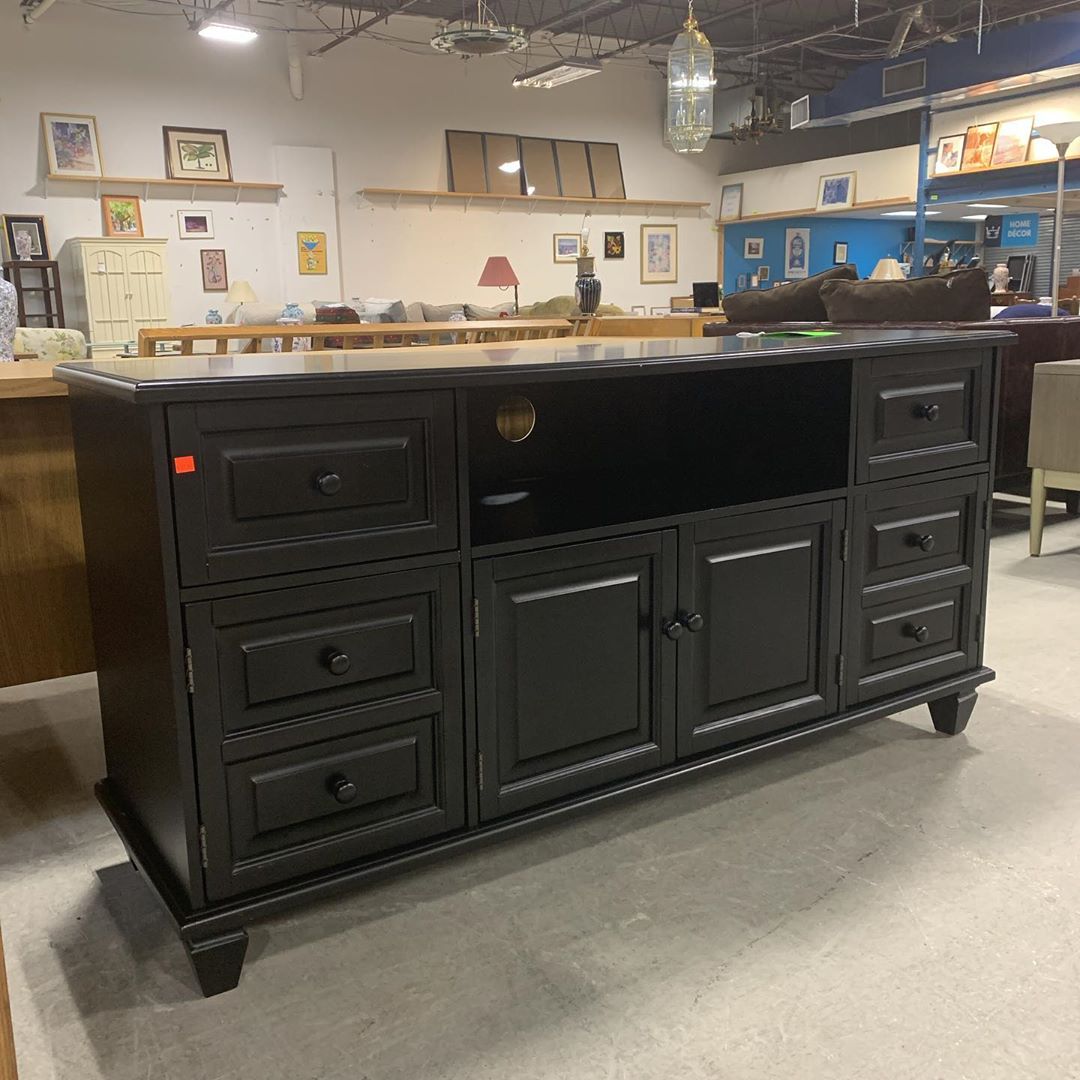 Black cabinet in furniture store. Photo by Instagram user @suffolkrestore