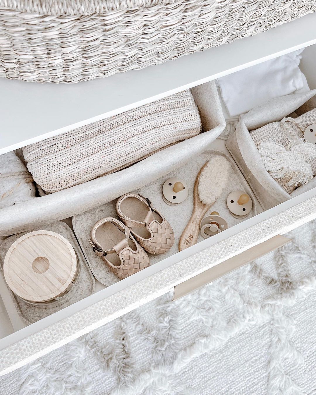 Drawer with baby items in drawer organizers. Photo by Instagram user @mytruthstory.