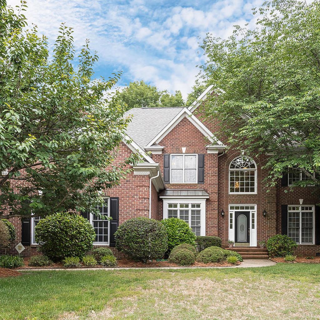 Large Neocolonial red brick home in Providence Crossing Charlotte. Photo by Instagram user @joanbgoode. 