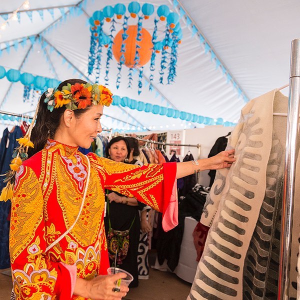 Person in booth at the International Folk Art Market. Photo by Instagram user @cityofsantafe.