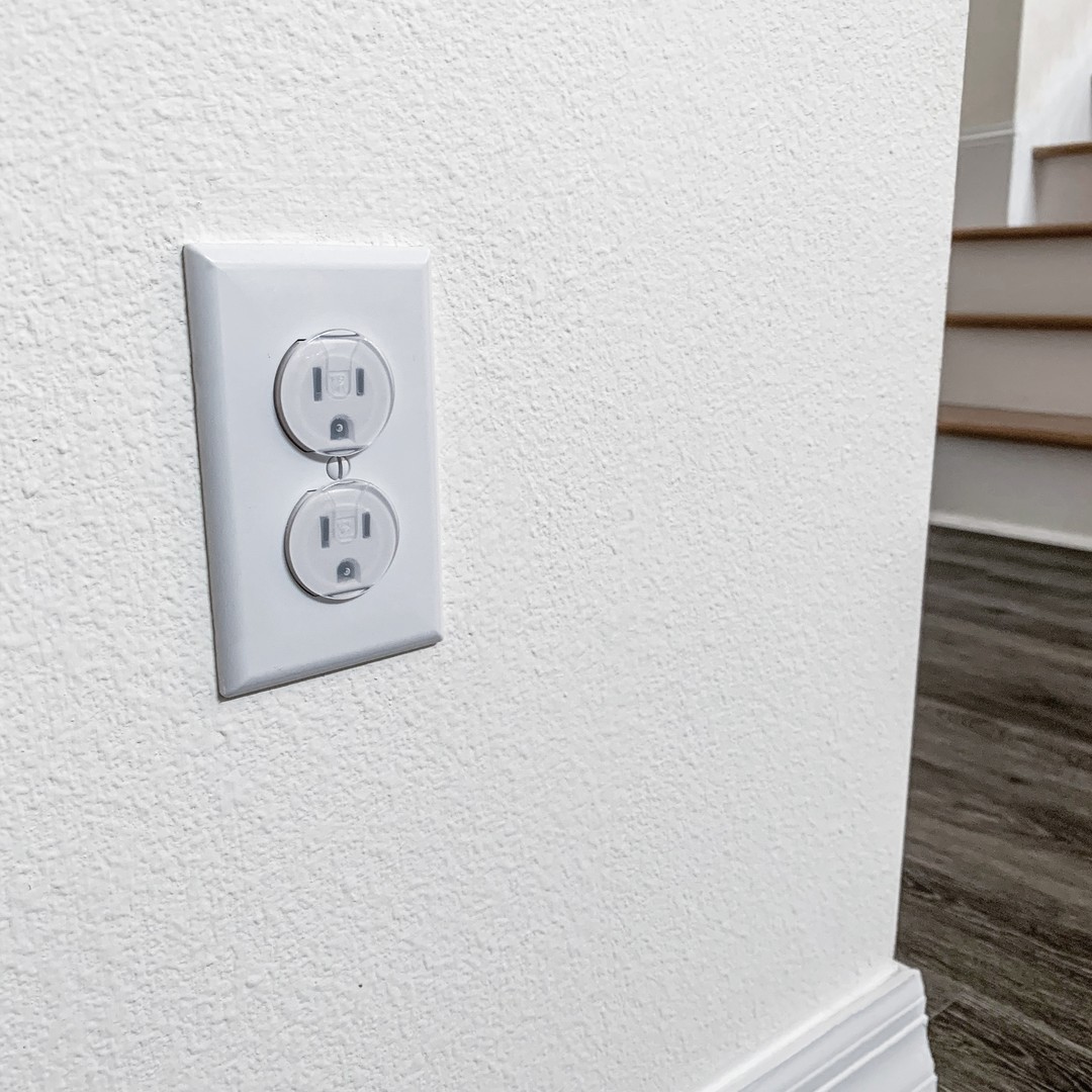 Outlet covers on electrical outlet. Photo by @joolbaby