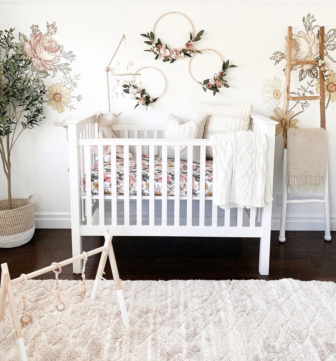 Floral themed nursery. Photo by Instagram user @house.becomes.home