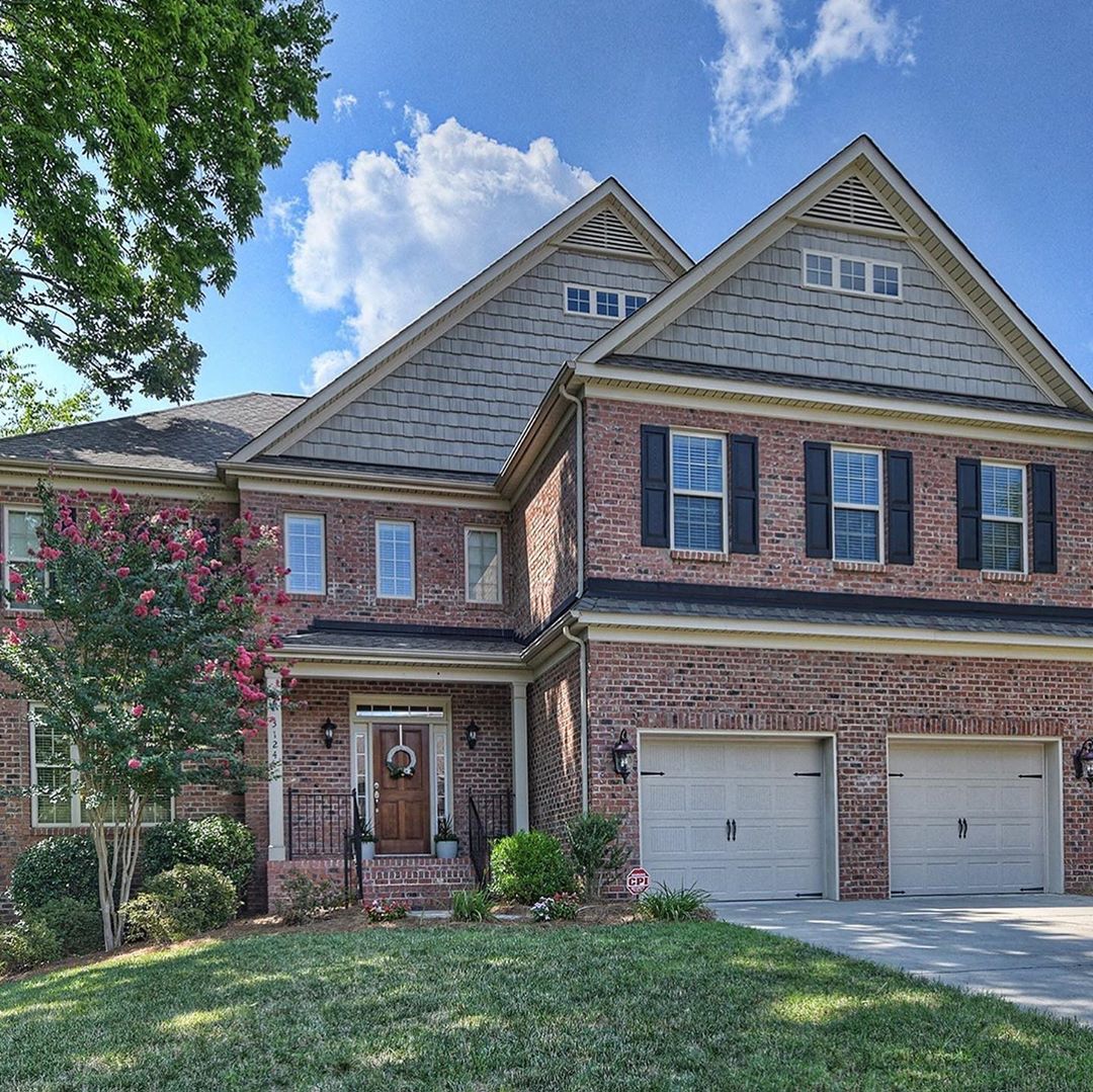 large red brick home in old providence north charlotte photo by Instagram user @mahoolnancerealtors