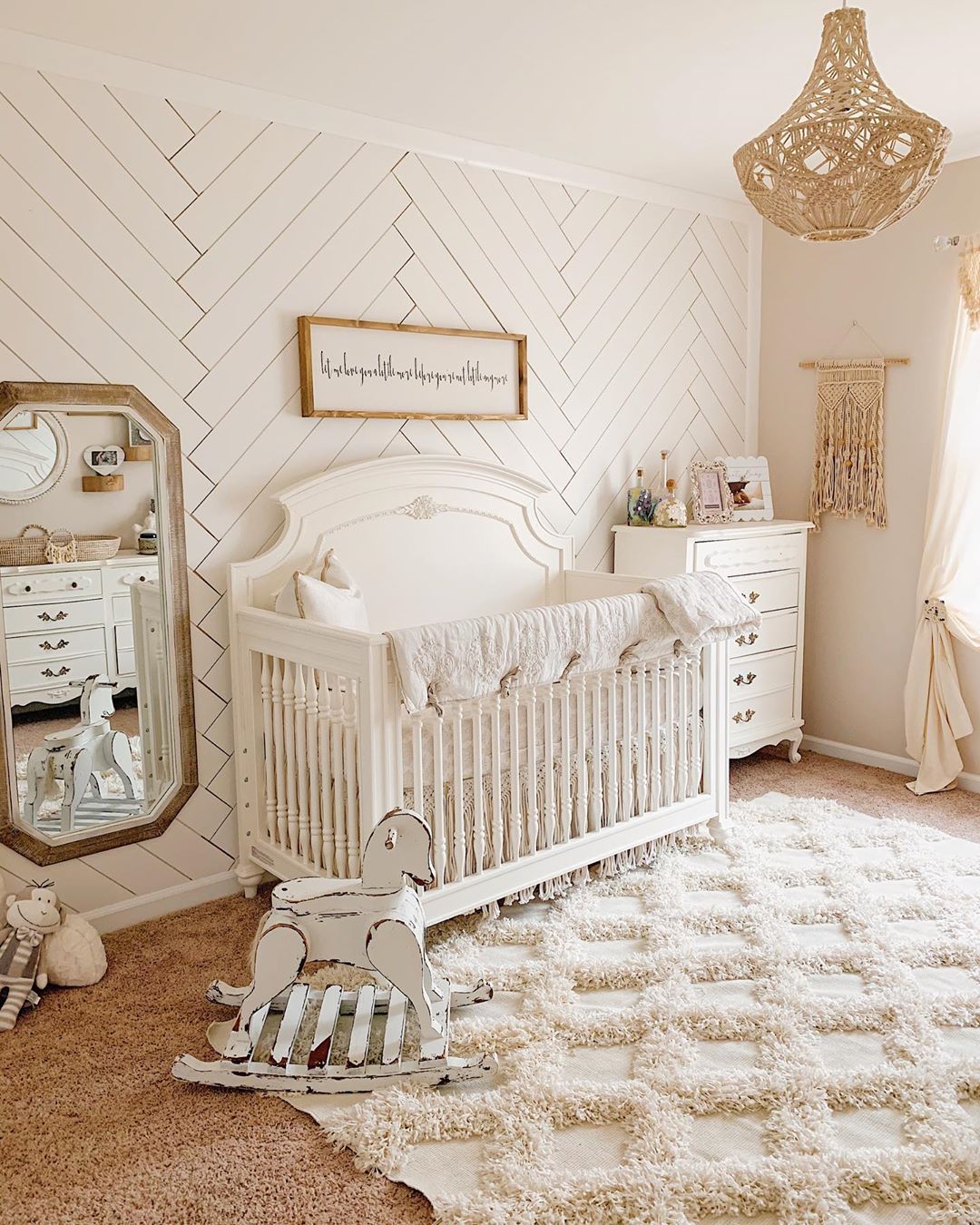 Neutral baby nursery with soft rug. Photo by Instagram user karlene_malcolm