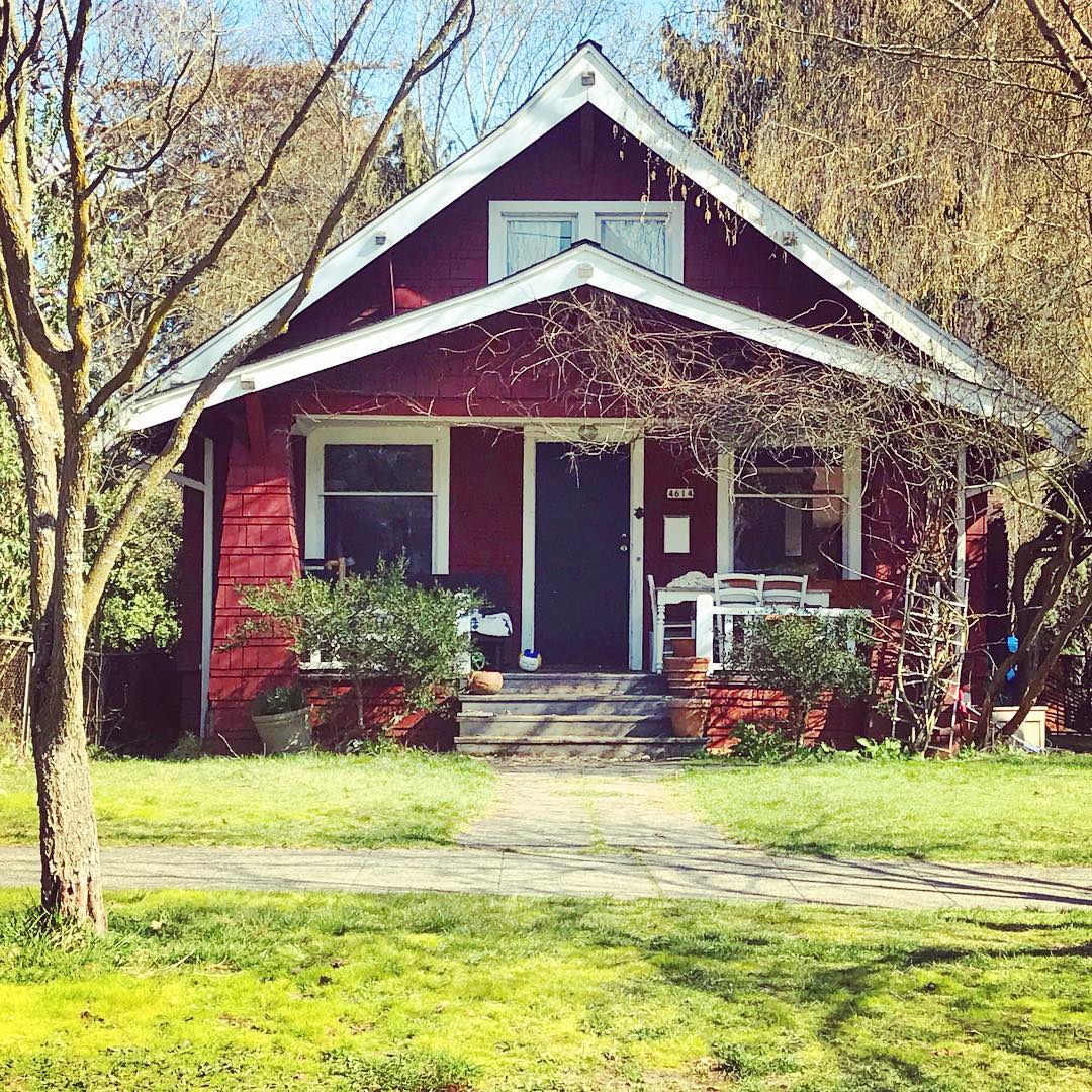 red bungalow style home in wallingford, seattle, WA photo by Instagram user @every.home.tells.a.story