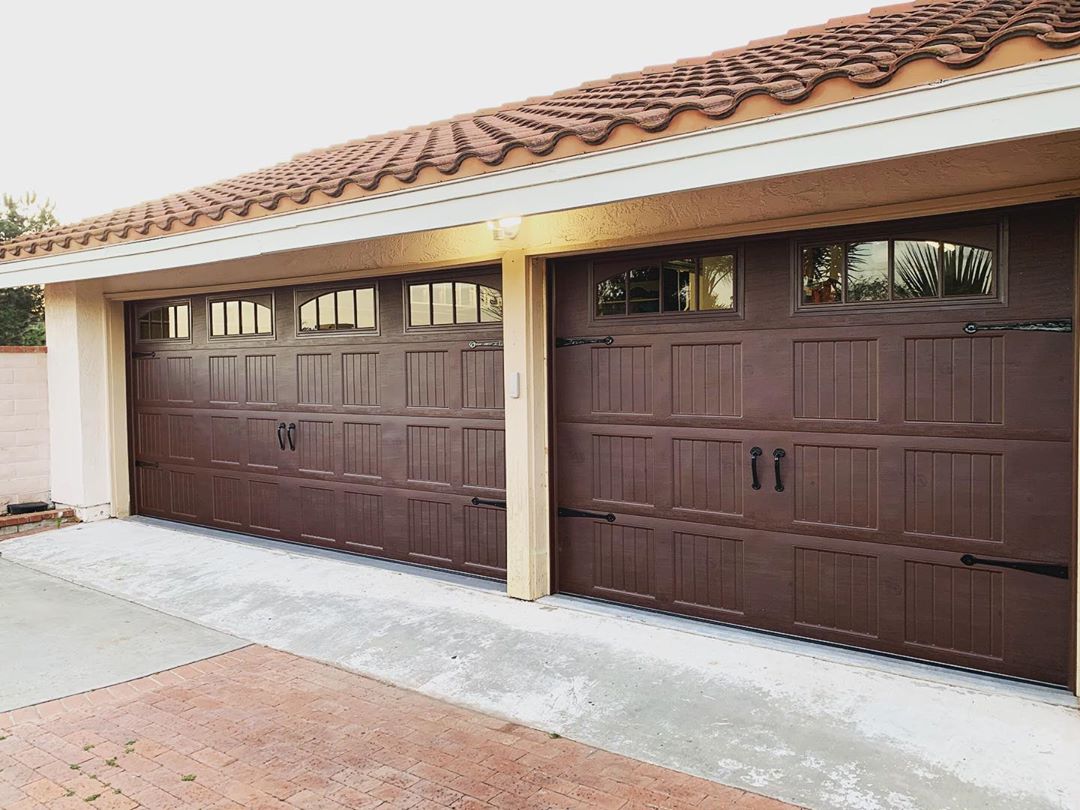 new garage doors with windows installed photo by Instagram user @rockstargaragedoorservices