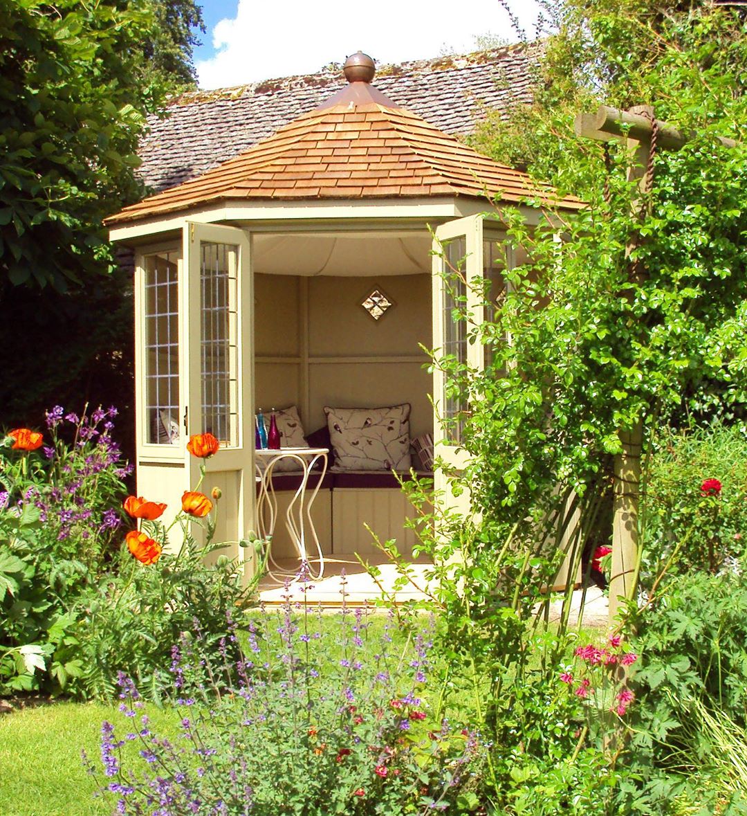backyard shed with seating space in garden photo by Instagram user @scotts_of_thrapston