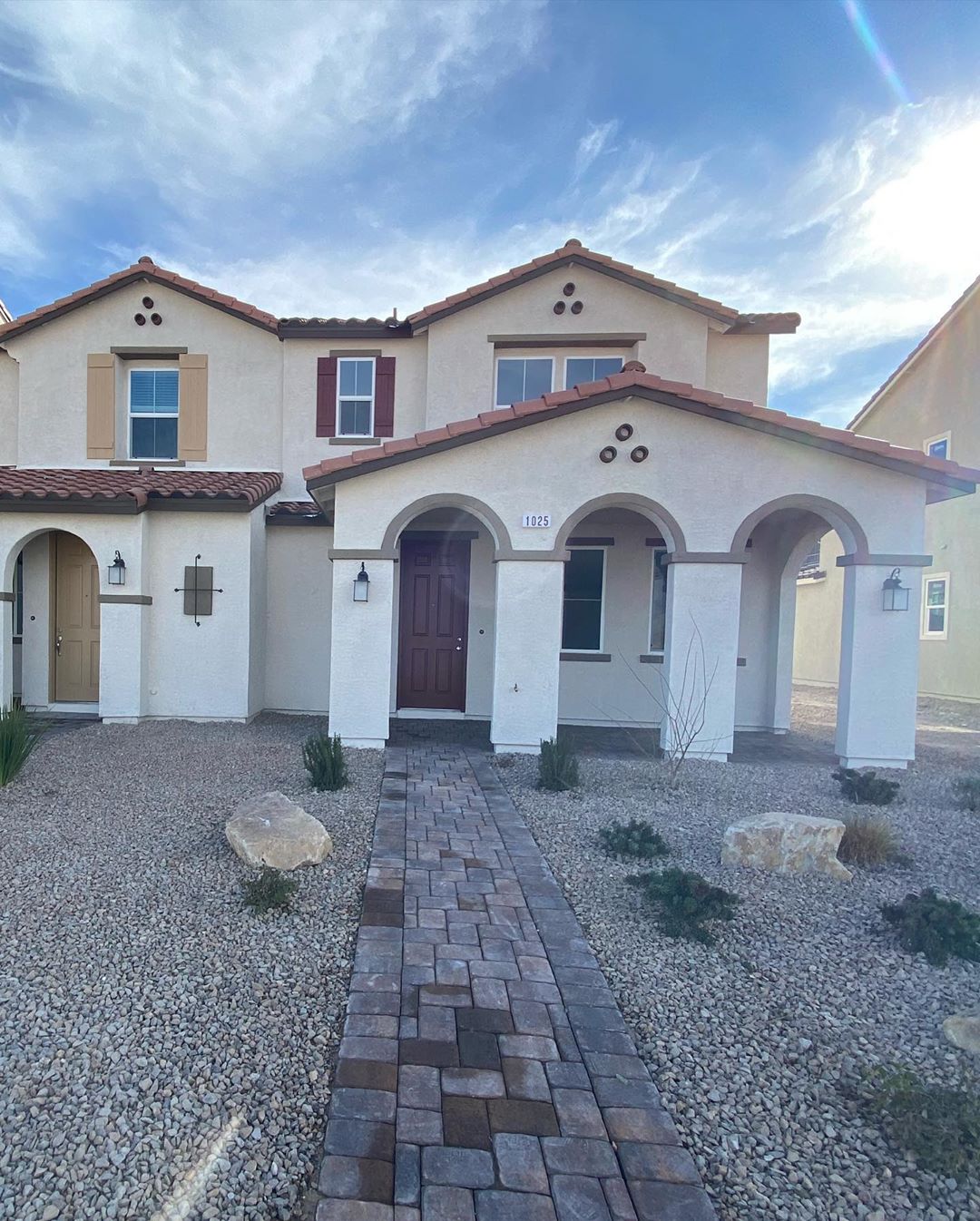 townhomes with Spanish style roof in Tule Springs, Las Vegas photo by Instagram user @kwsn_propertymanagement