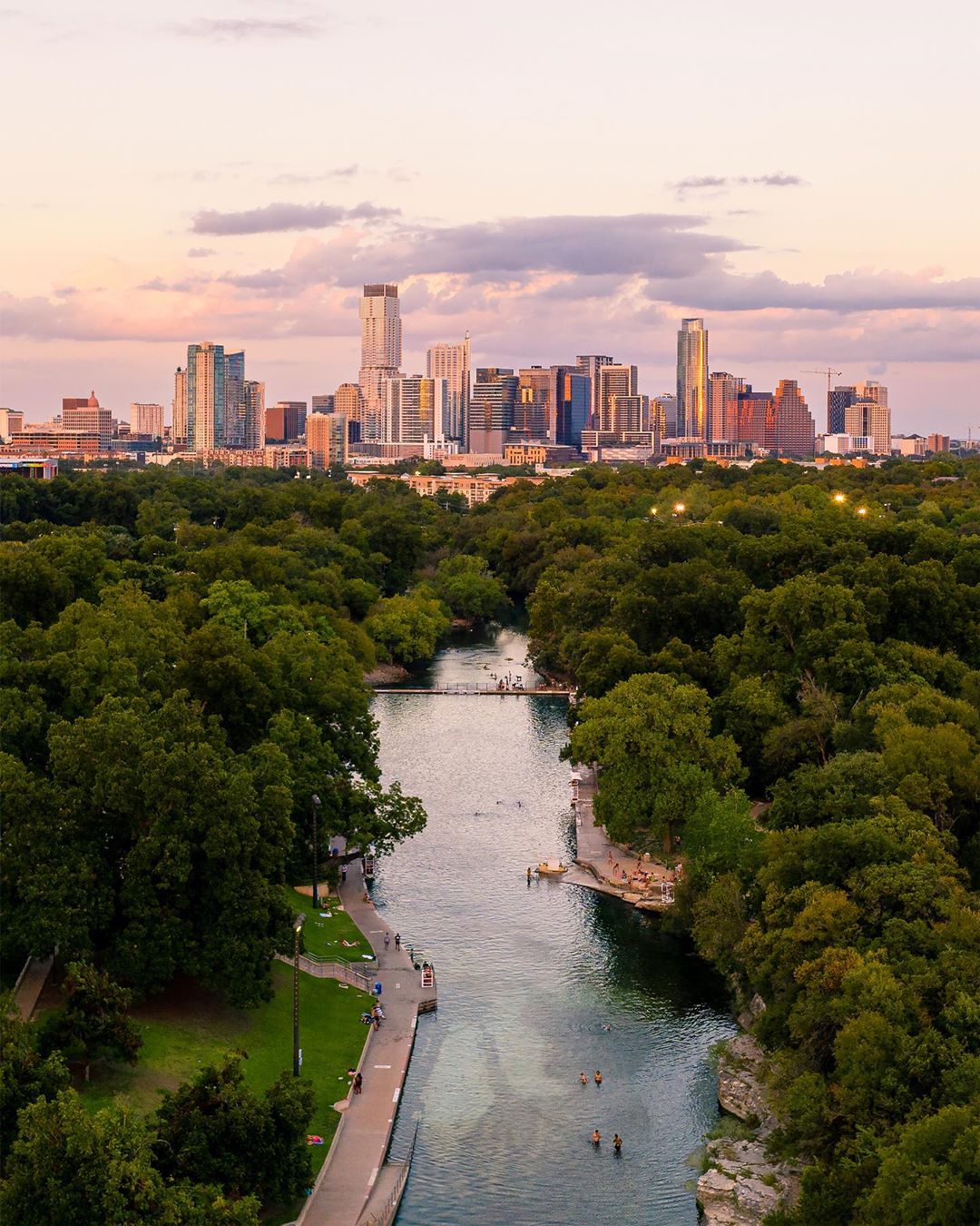 View of Downtown Austin from the Barton Springs Pool. Photo by Instagram user @flowkyte