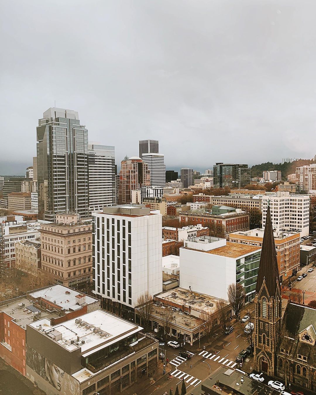 Downtown Portland Skyline with Gray Skies Above. Photo by Instagram user @felicityoftheseas