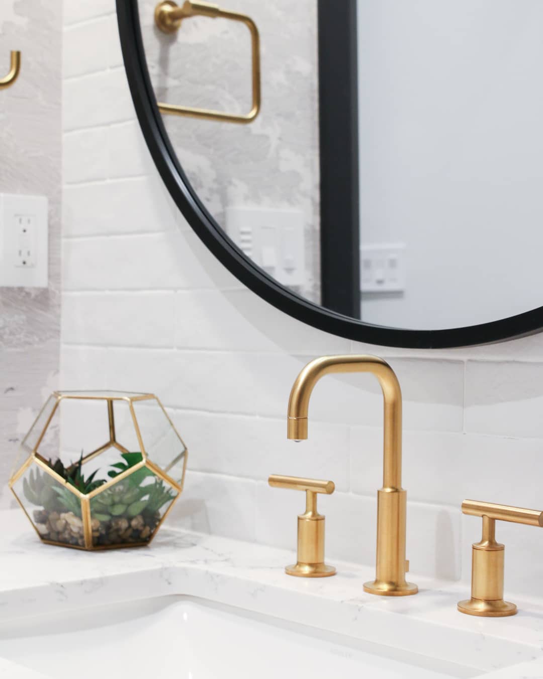 bathroom vanity with new gold faucet photo by Instagram user @beyond_beige