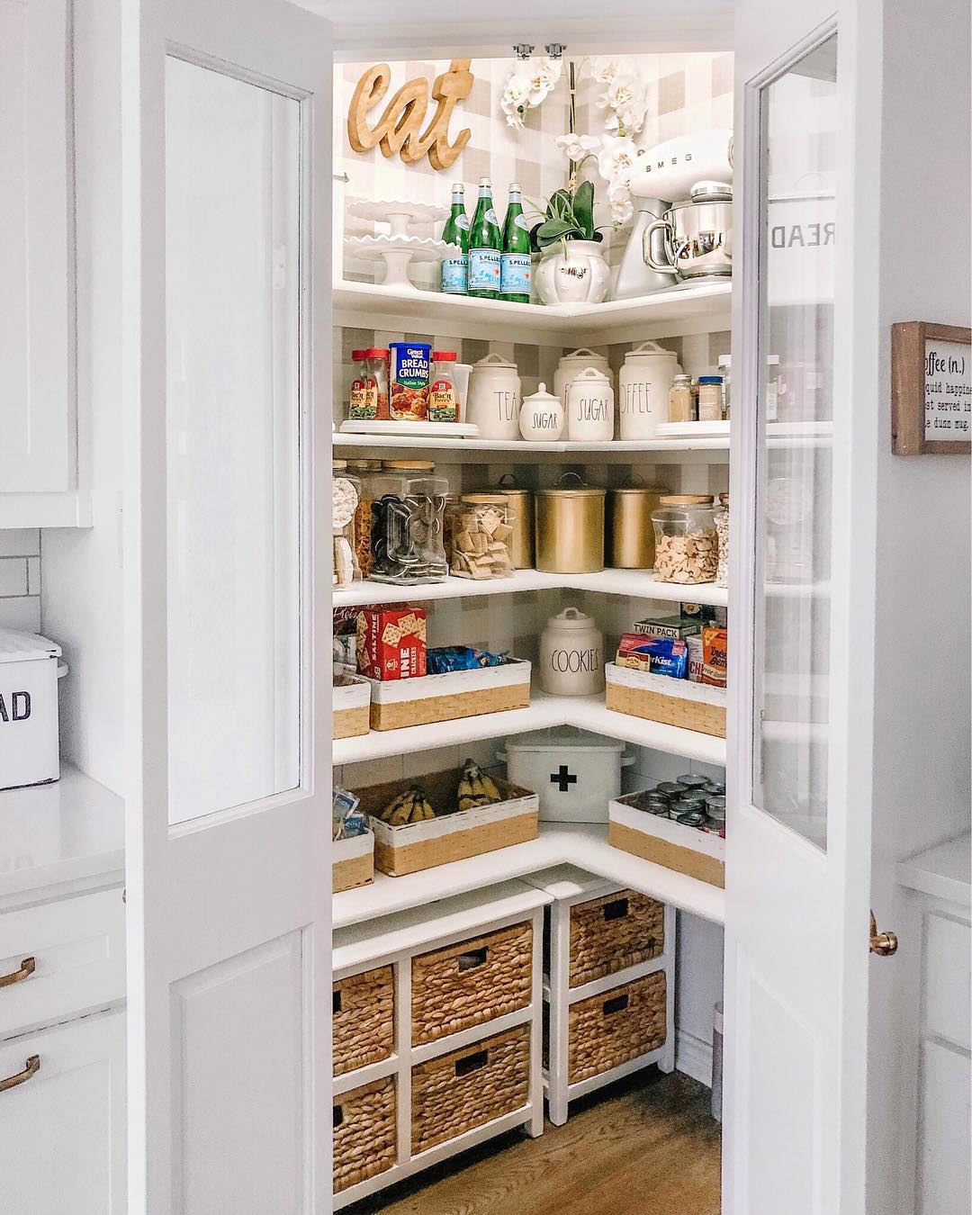 kitchen pantry built into corner of kitchen photo by Instagram user @thedowntownaly