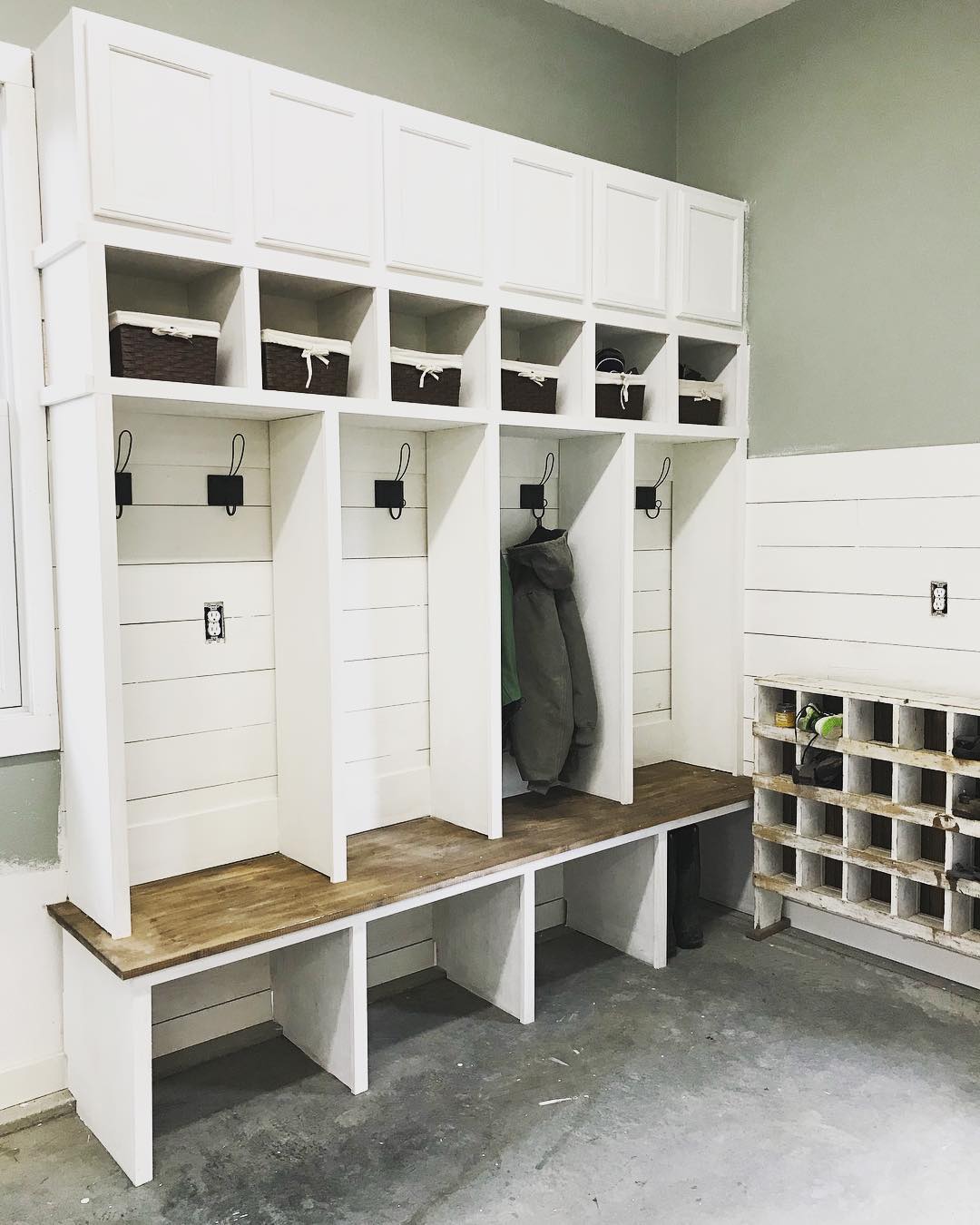 finished garage with mudroom shelving built in photo by Instagram user @cottontailfarmhouse