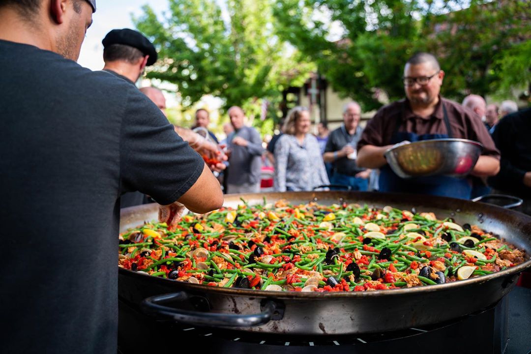 pan of paella being made on the street photo by Instagram user @thebasquemarket