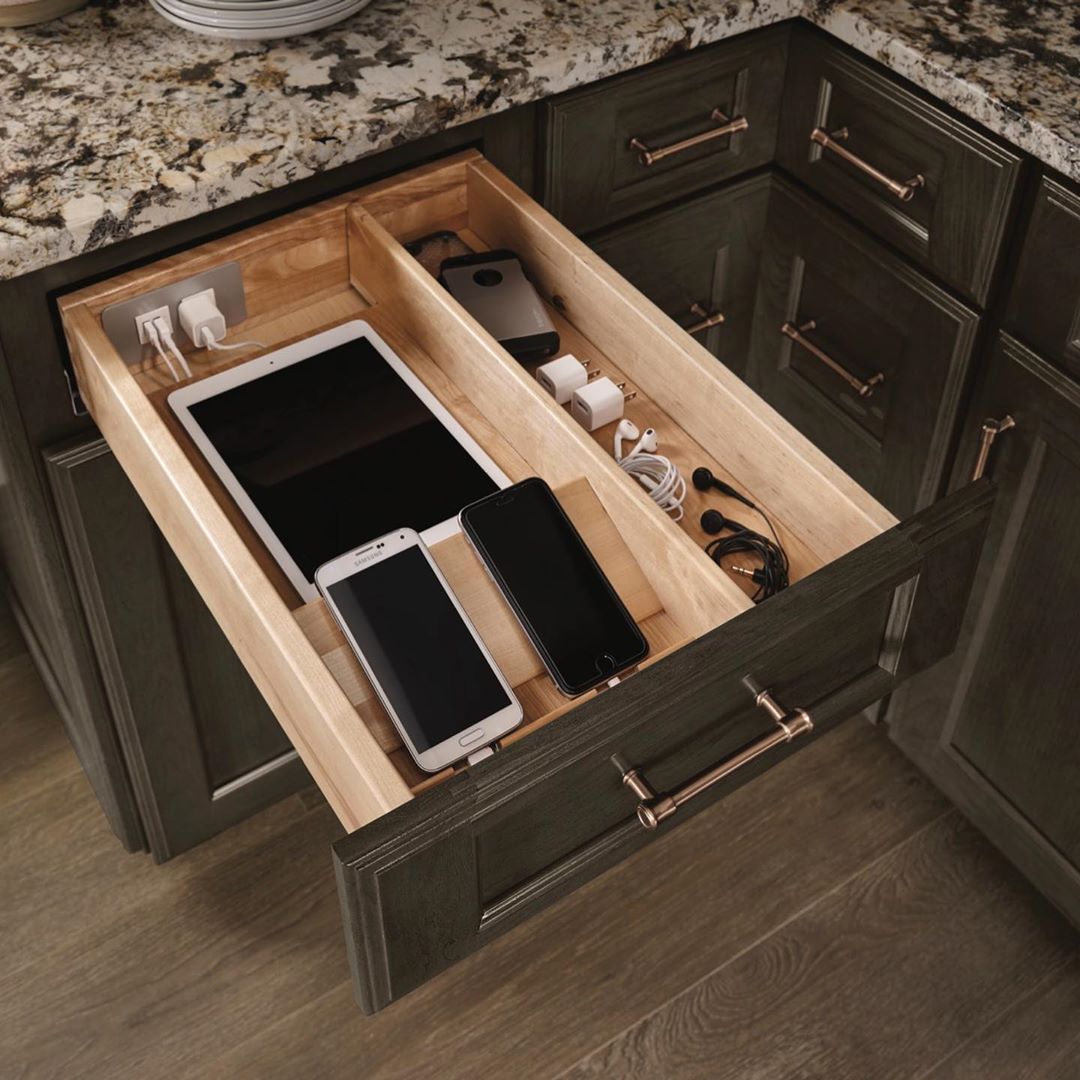 Technology drawer with power supply built in for hidden charging station. Photo by Instagram user @kitchens_chelsealumber