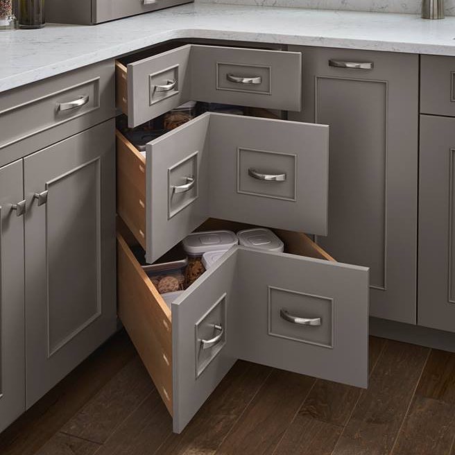 Oversized corner drawers in kitchen. Photo by Instagram user @designcraftcabinetry