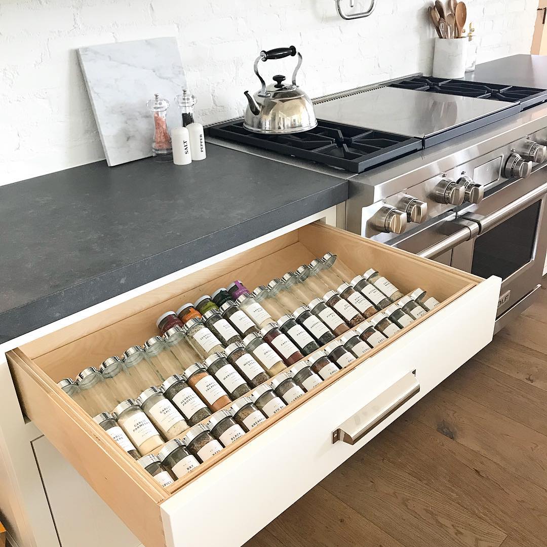 Spice rack installed in a spice drawer. Photo by Instagram user @chelseagthomas