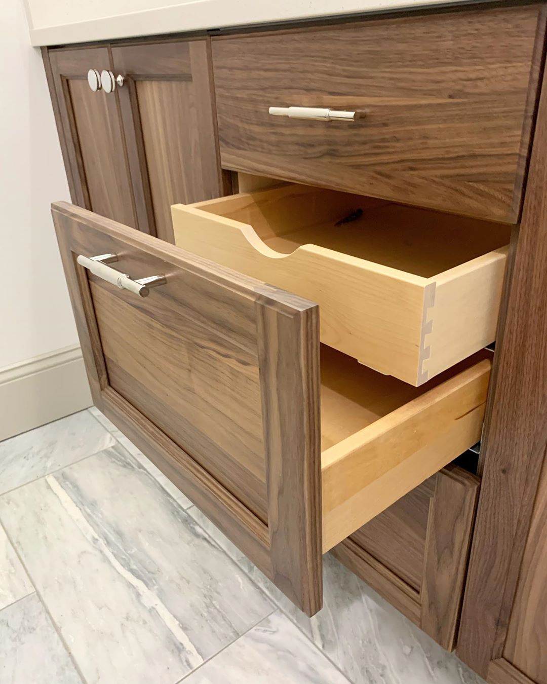 Hidden double drawers in a bathroom vanity. Photo by Instagram user @edenn_design