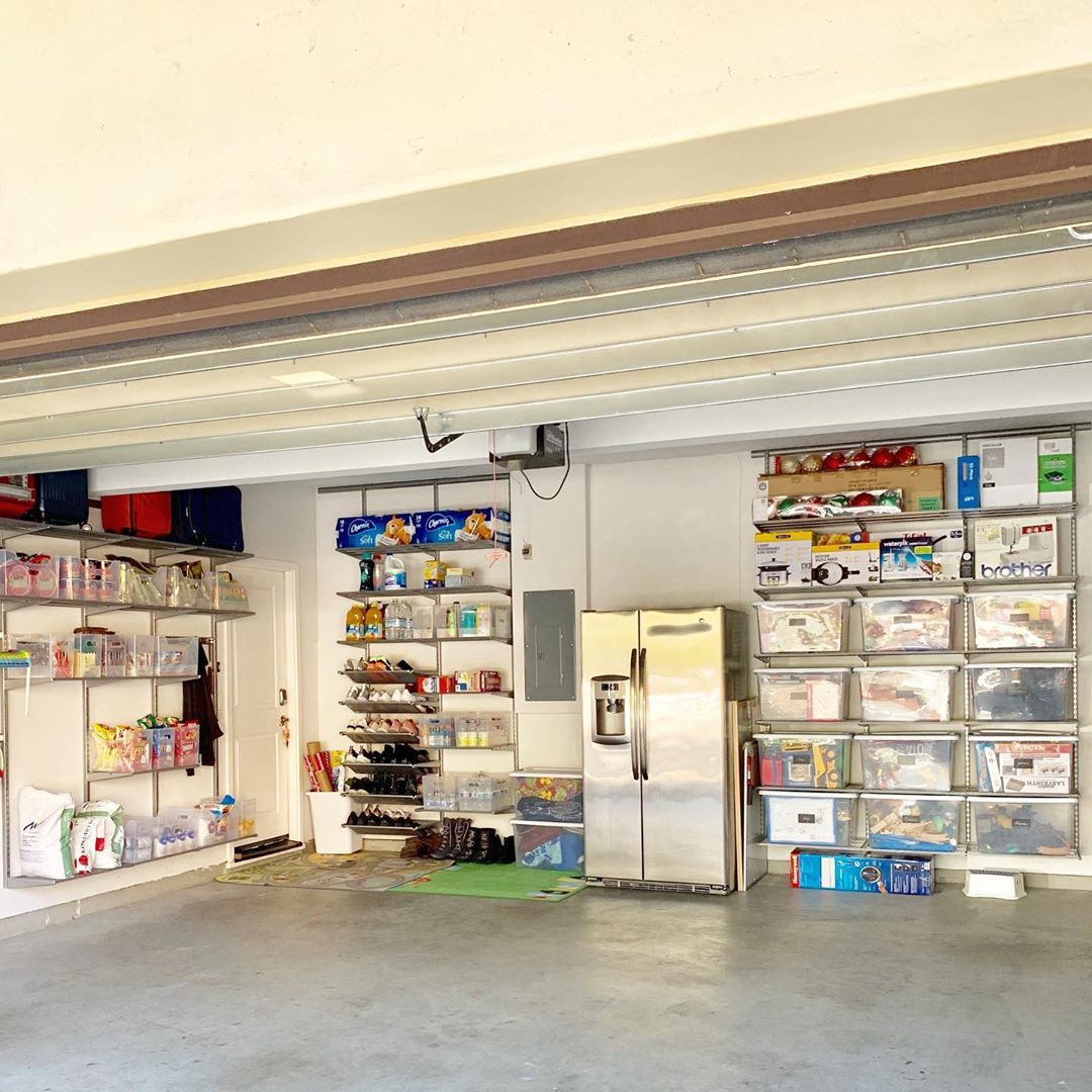 Garage Organized with Vertical Shelving and Plastic Totes. Photo by Instagram user @beeorganizedsfbay