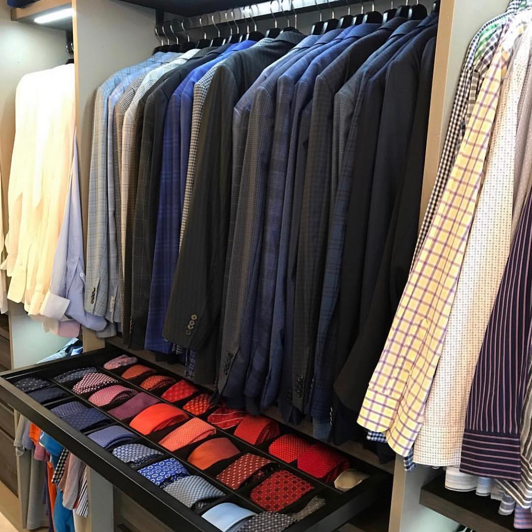 Organized Men's Closet with Tie Drawer Pulled Out. Photo by Instagram user @joelthrinidad