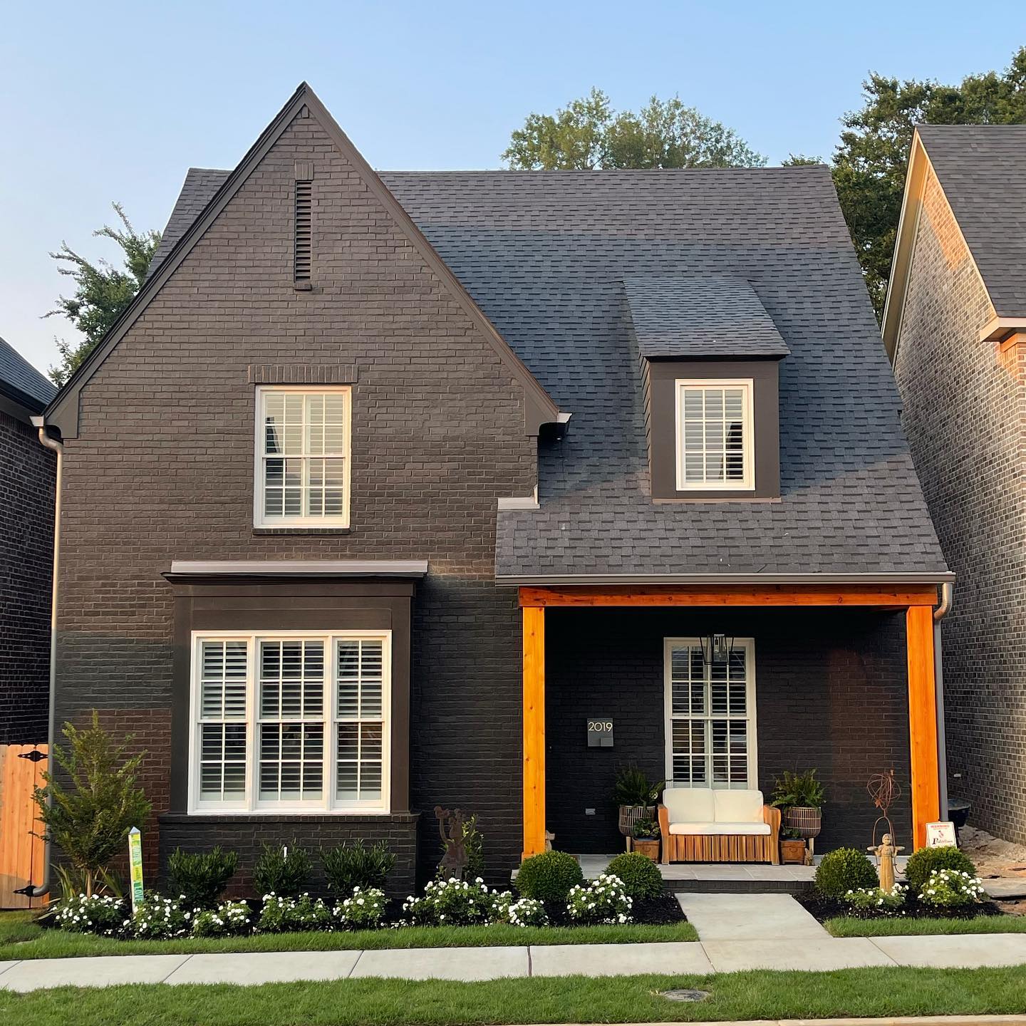 A black brick home in Cooper-young Memphis. Photo by Instagram user @theberryhometeam.