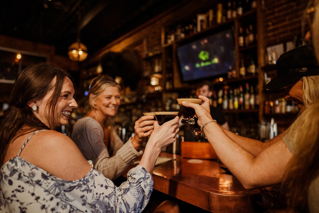 Three Women Toasting Drinks at the Mandarin Hide. Photo by Instagram user @mandarinhide