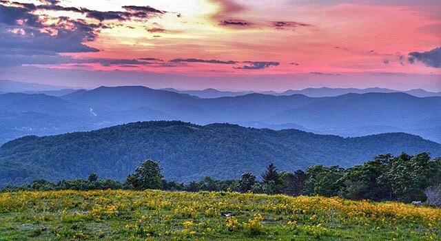 Sunset over Bearwallow Mountain in Asheville, NC. Photo by Instagram user @toddroy