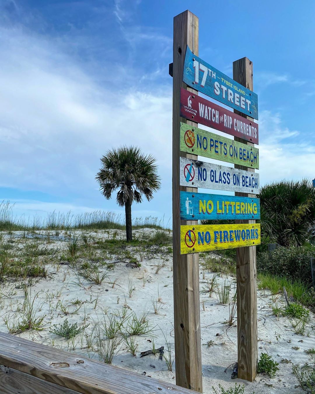 Signs on the Beach at Tybee Island, GA. Photo by Instagram user @annanotsogrimm